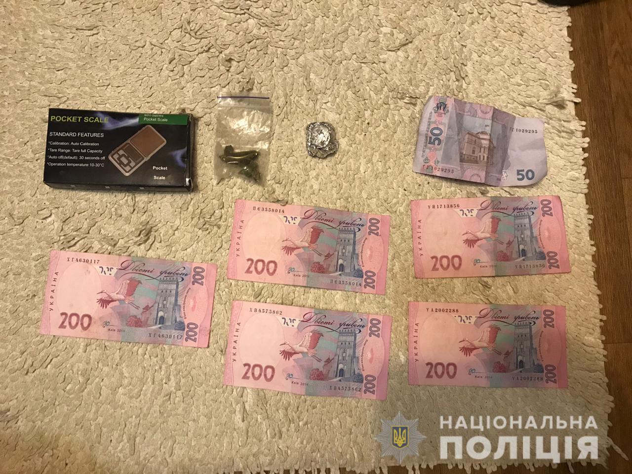 Изъятые у преступников деньги. Фото: kv.npu.gov.ua