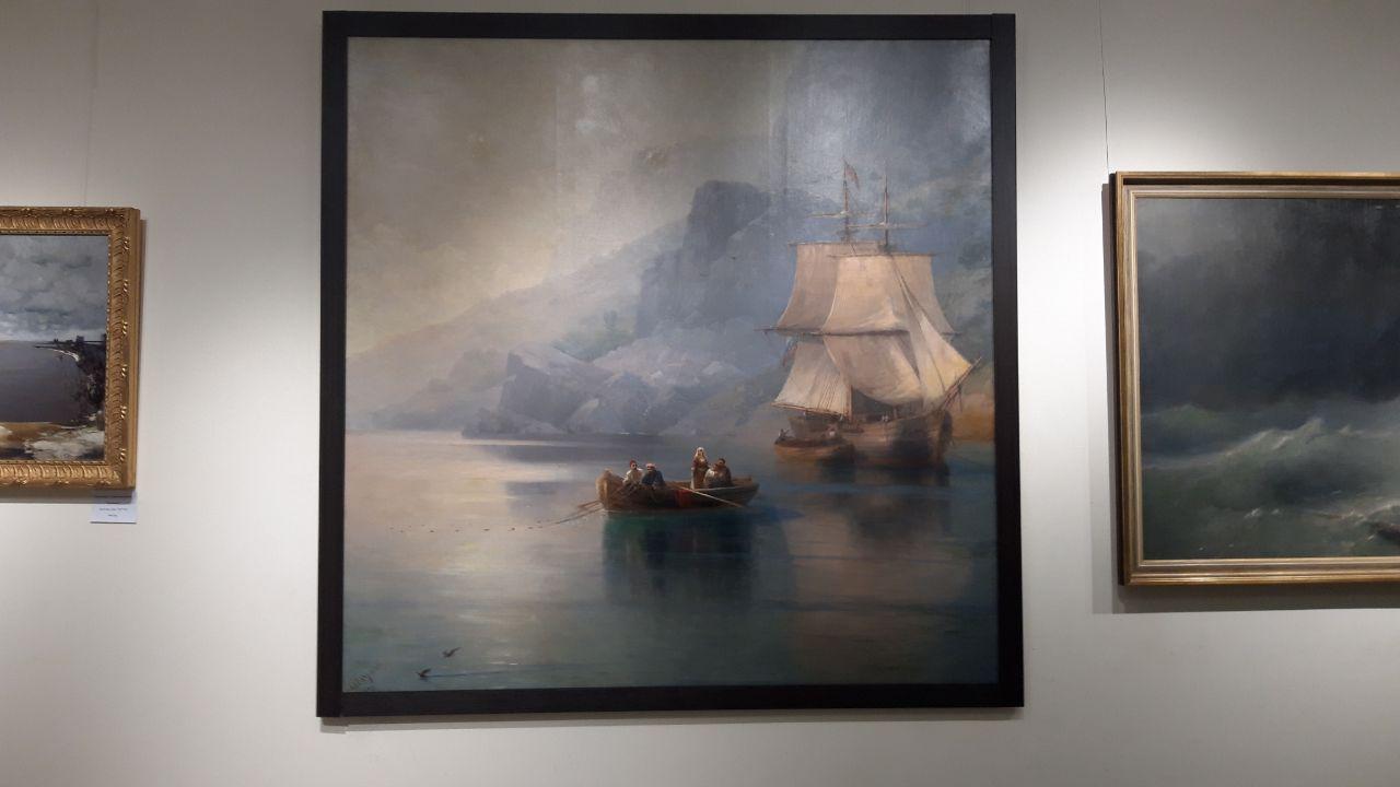 Картина Айвазовского Рыбацкая лодка с торговым бригом на якоре